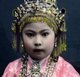 Malaysia: A young nyonya or Peranakan girl, Penang, c. 1915